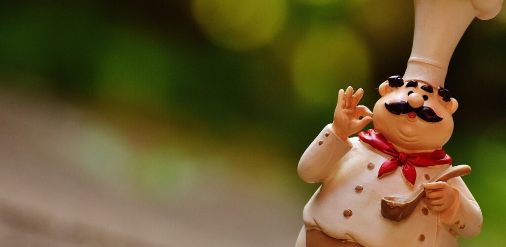spécialités Auvergne Rhône alpes : figurine d'un chef dodu